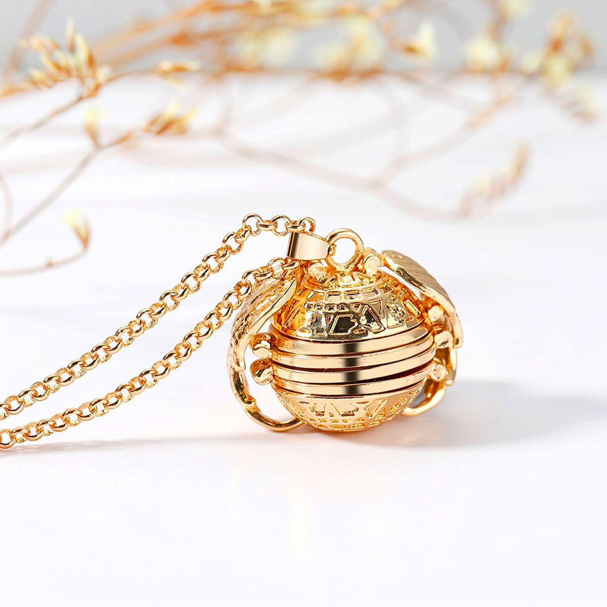 Uttrekkbart medaljongkjede med plass til bilder