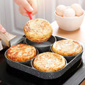 Frying pan with four holes and non-stick coating