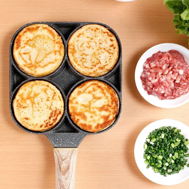 Frying pan with four holes and non-stick coating
